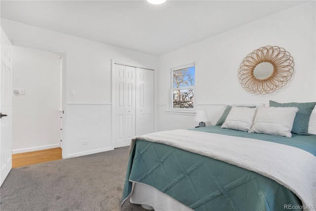 carpeted bedroom featuring a closet