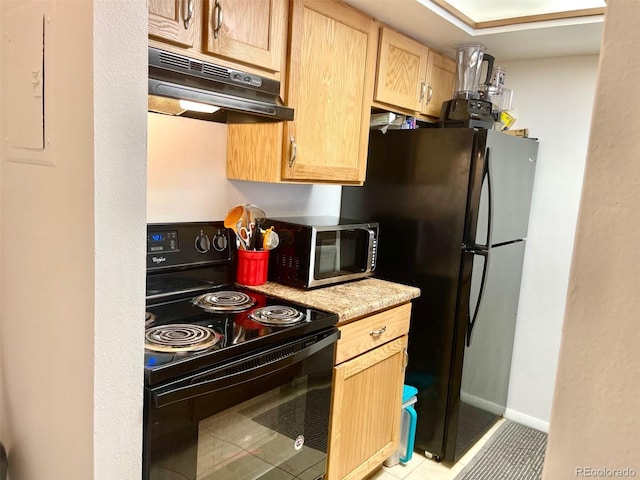4281 S Salida Way Unit 5, Aurora, CO 80013 - kitchen featuring black appliances, under cabinet range hood, light countertops, light brown cabinetry, and light tile patterned floors