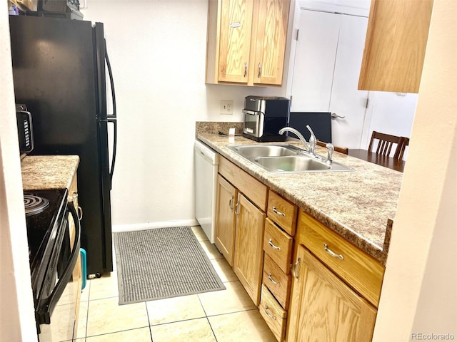 4281 S Salida Way Unit 5, Aurora, CO 80013 - kitchen with black appliances, a sink, light tile patterned flooring, light countertops, and light brown cabinetry