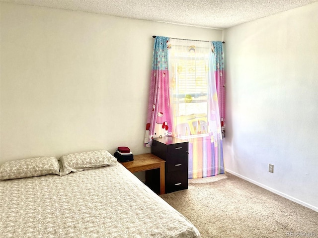 4281 S Salida Way Unit 5, Aurora, CO 80013 - carpeted bedroom with a textured ceiling and baseboards