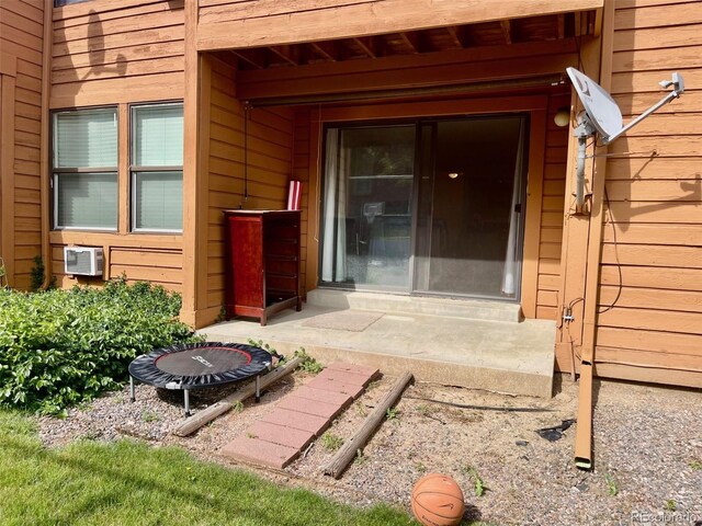 4281 S Salida Way Unit 5, Aurora, CO 80013 - doorway to property featuring cooling unit