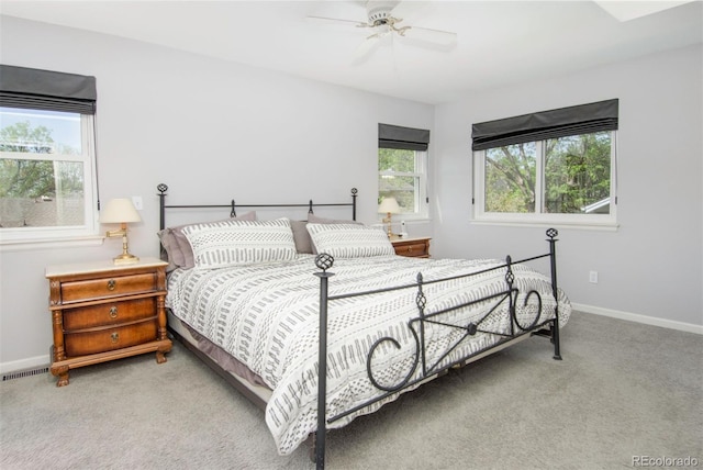 2935 Bow Line Pl, Longmont, CO 80503 - bedroom with light colored carpet, baseboards, and ceiling fan