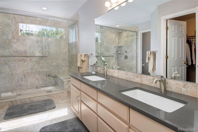 2935 Bow Line Pl, Longmont, CO 80503 - full bath featuring a shower stall, double vanity, and a spacious closet