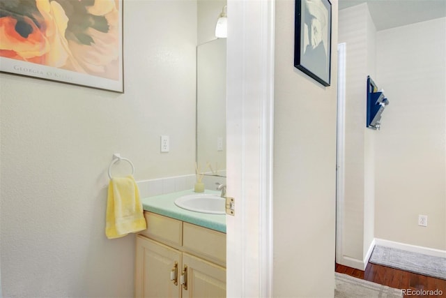 2935 Bow Line Pl, Longmont, CO 80503 - bathroom with wood finished floors and vanity