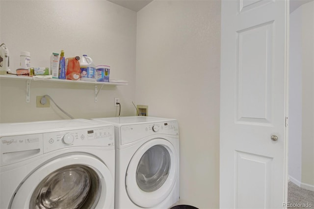 2935 Bow Line Pl, Longmont, CO 80503 - washroom with washing machine and clothes dryer and light colored carpet