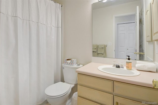 2935 Bow Line Pl, Longmont, CO 80503 - bathroom with toilet, vanity, and a shower with shower curtain