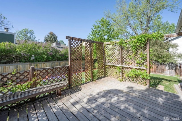 2935 Bow Line Pl, Longmont, CO 80503 - wooden deck with a fenced backyard
