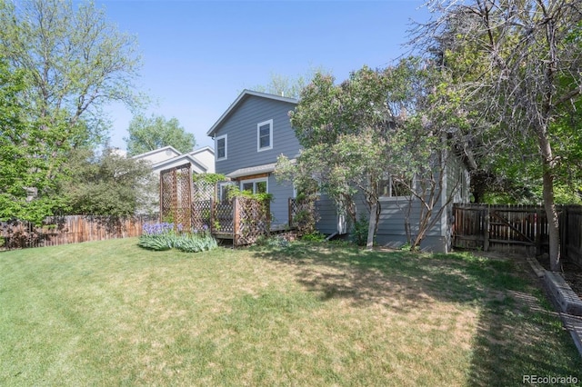 2935 Bow Line Pl, Longmont, CO 80503 - view of yard featuring a deck