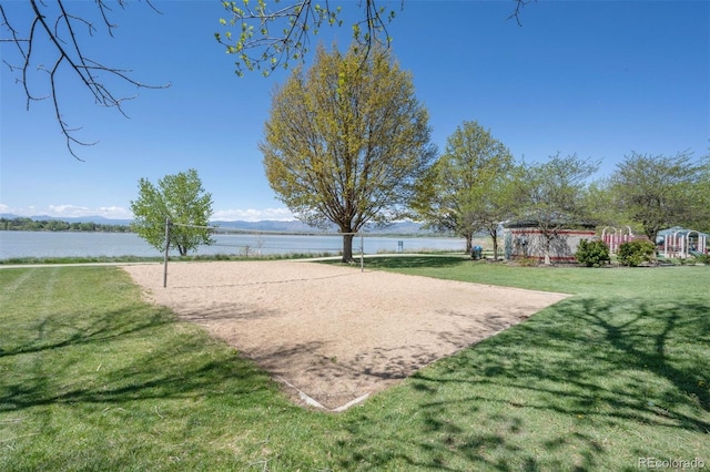 2935 Bow Line Pl, Longmont, CO 80503 - view of home's community with volleyball court, a water view, and a yard