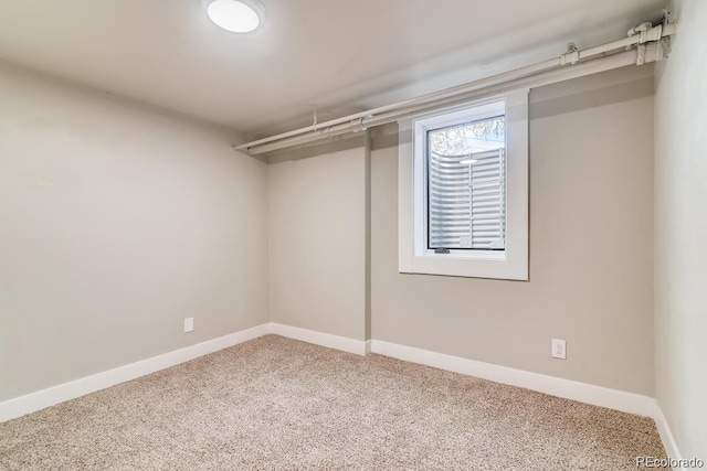 1602 11th Ave, Greeley, CO 80631 - below grade area featuring carpet flooring and baseboards