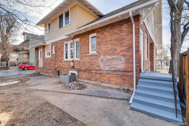 1602 11th Ave, Greeley, CO 80631 - view of property exterior with brick siding