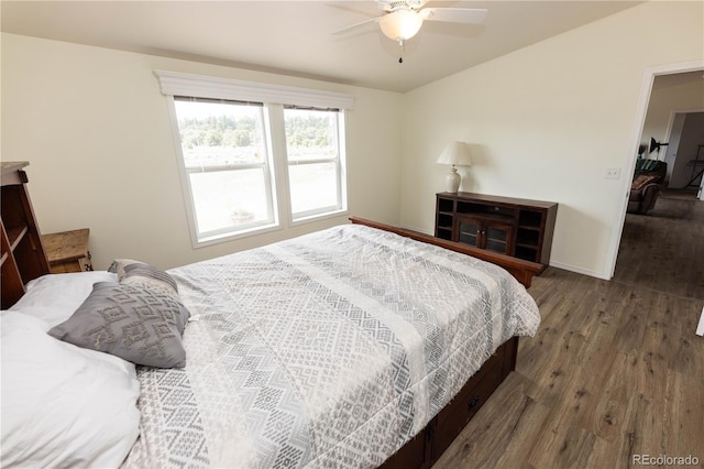 3130 Elk Park Rd, San Luis, CO 81152 - bedroom with wood finished floors, baseboards, a ceiling fan, and lofted ceiling