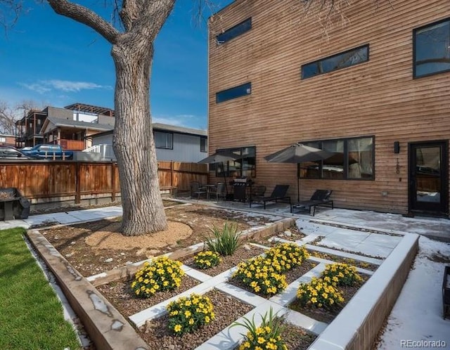 view of yard featuring a patio area and fence