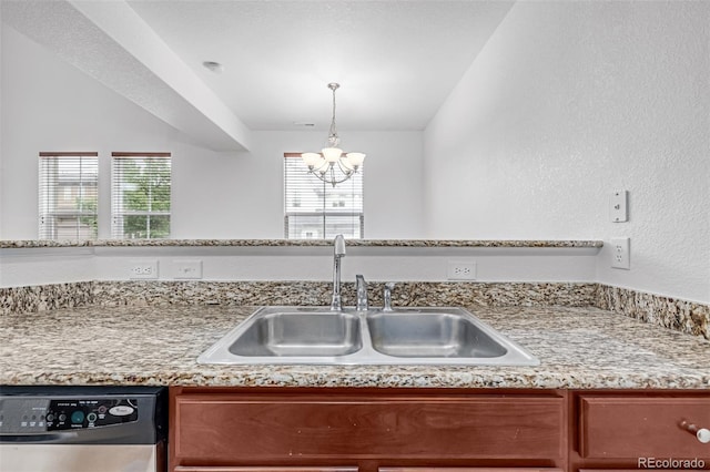 7777 E 23rd Ave Unit 1406, Denver, CO 80238 - kitchen featuring dishwasher, a sink, and a chandelier