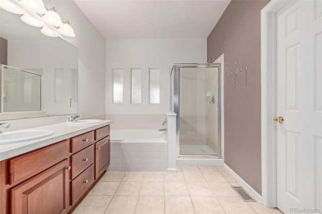 7777 E 23rd Ave Unit 1406, Denver, CO 80238 - bathroom with a garden tub, tile patterned floors, double vanity, and a stall shower
