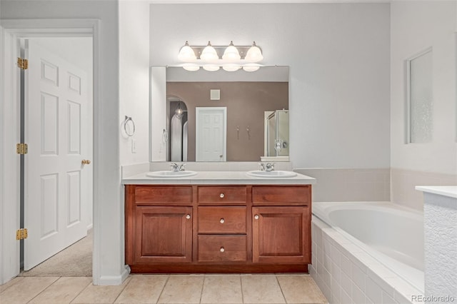 7777 E 23rd Ave Unit 1406, Denver, CO 80238 - bathroom featuring tile patterned flooring, double vanity, and a bath