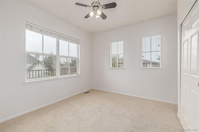 7777 E 23rd Ave Unit 1406, Denver, CO 80238 - unfurnished bedroom featuring carpet flooring, baseboards, and a ceiling fan
