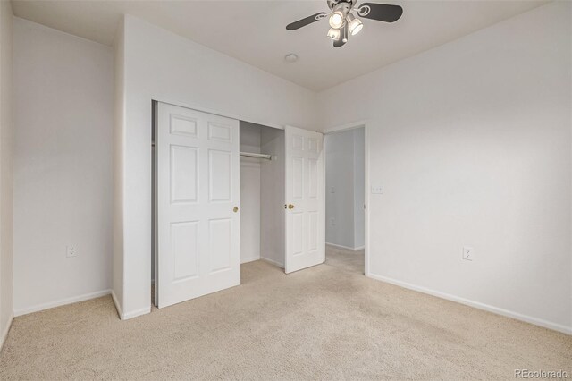 7777 E 23rd Ave Unit 1406, Denver, CO 80238 - unfurnished bedroom with carpet, a closet, baseboards, and a ceiling fan