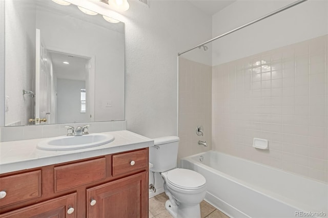 7777 E 23rd Ave Unit 1406, Denver, CO 80238 - full bathroom with toilet, vanity, shower / bathtub combination, and tile patterned floors