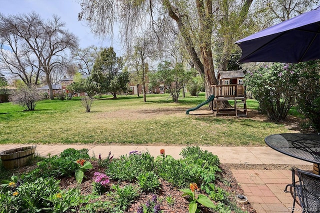 view of yard with a playground