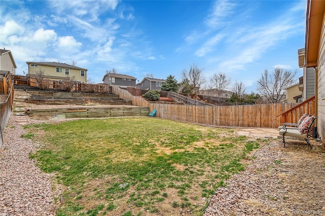 view of yard featuring a fenced backyard