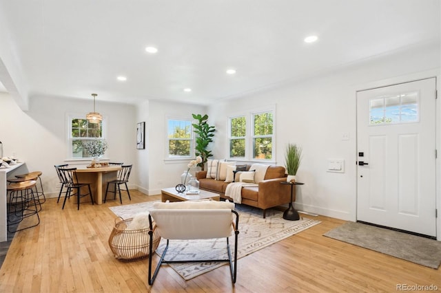 4465 N Umatilla St, Denver, CO 80211 - living room featuring healthy amount of natural light, light wood-style floors, and recessed lighting