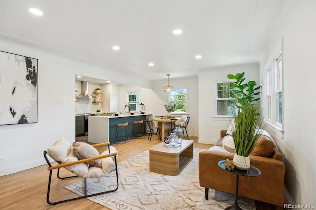 4465 N Umatilla St, Denver, CO 80211 - living room featuring light wood-type flooring and recessed lighting