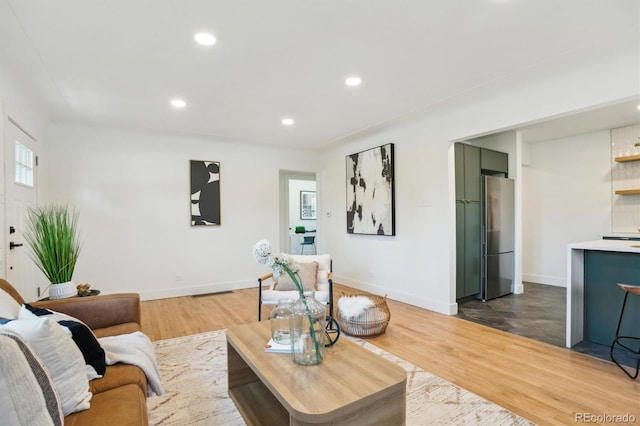 4465 N Umatilla St, Denver, CO 80211 - living area featuring wood finished floors and recessed lighting