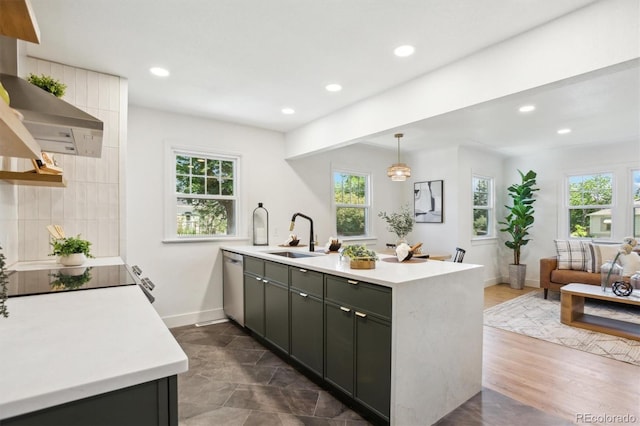 4465 N Umatilla St, Denver, CO 80211 - kitchen featuring a peninsula, plenty of natural light, light countertops, and recessed lighting
