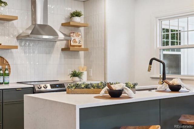4465 N Umatilla St, Denver, CO 80211 - kitchen with wall chimney exhaust hood, open shelves, gray cabinetry, and tasteful backsplash