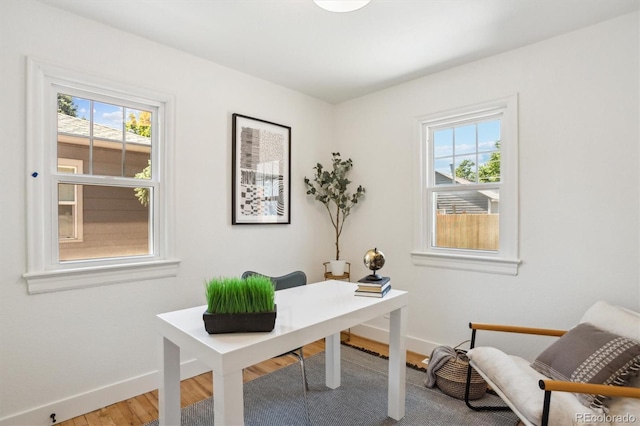 4465 N Umatilla St, Denver, CO 80211 - home office with healthy amount of natural light and wood finished floors