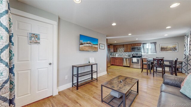 living room with light wood-type flooring