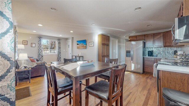 dining area featuring light hardwood / wood-style flooring