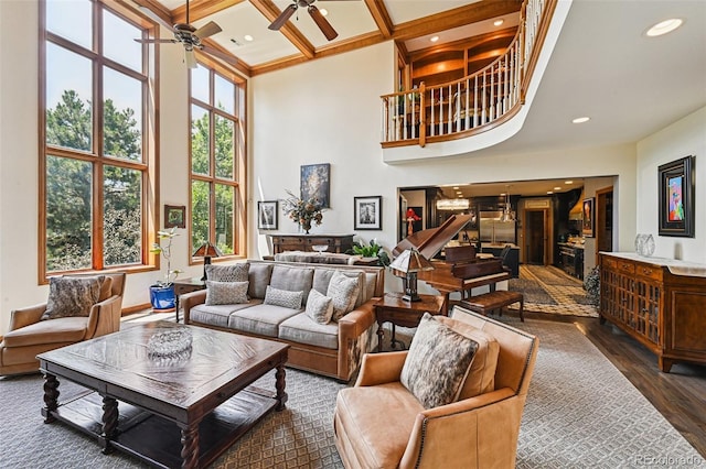 5475 S Laredo St, Centennial, CO 80015 - living area with a ceiling fan, coffered ceiling, a towering ceiling, recessed lighting, and dark wood finished floors