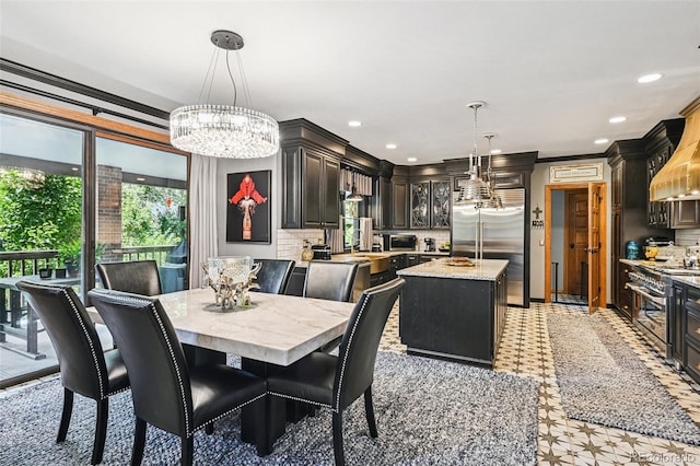 5475 S Laredo St, Centennial, CO 80015 - dining area featuring a chandelier, recessed lighting, and crown molding