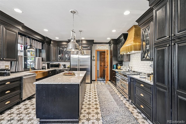 5475 S Laredo St, Centennial, CO 80015 - kitchen featuring high quality appliances, a kitchen island, custom range hood, decorative backsplash, and crown molding