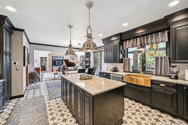 5475 S Laredo St, Centennial, CO 80015 - kitchen featuring light floors, a kitchen island, backsplash, open floor plan, and crown molding