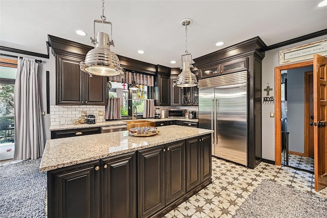 5475 S Laredo St, Centennial, CO 80015 - kitchen with appliances with stainless steel finishes, healthy amount of natural light, crown molding, light floors, and backsplash