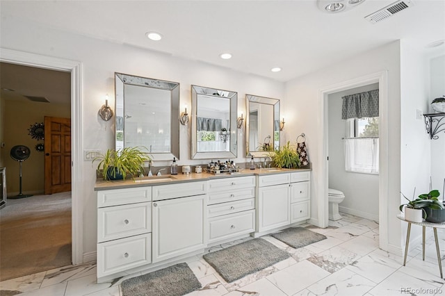 5475 S Laredo St, Centennial, CO 80015 - full bathroom with marble finish flooring, double vanity, and recessed lighting