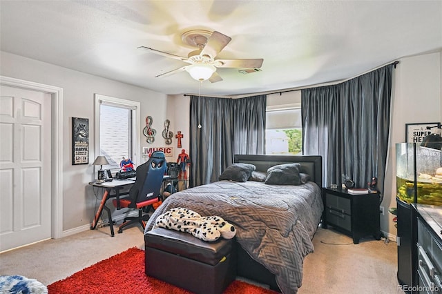 5475 S Laredo St, Centennial, CO 80015 - bedroom with light carpet, ceiling fan, and an office area