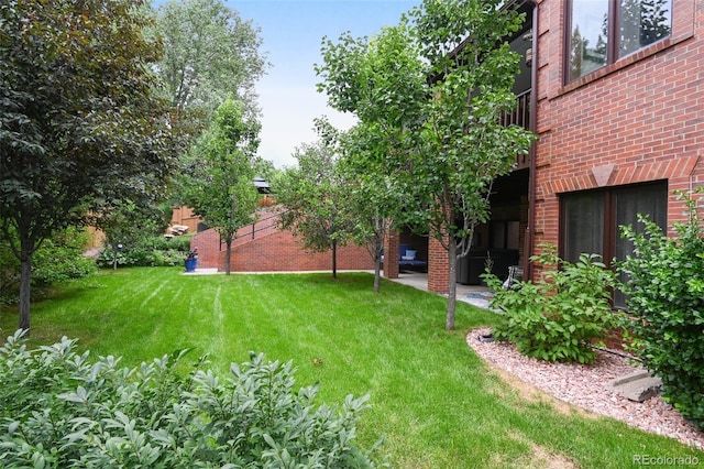 5475 S Laredo St, Centennial, CO 80015 - view of green lawn featuring a patio area