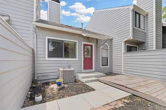 323 S Taft Ct Unit 26, Louisville, CO 80027 - view of exterior entry with a chimney