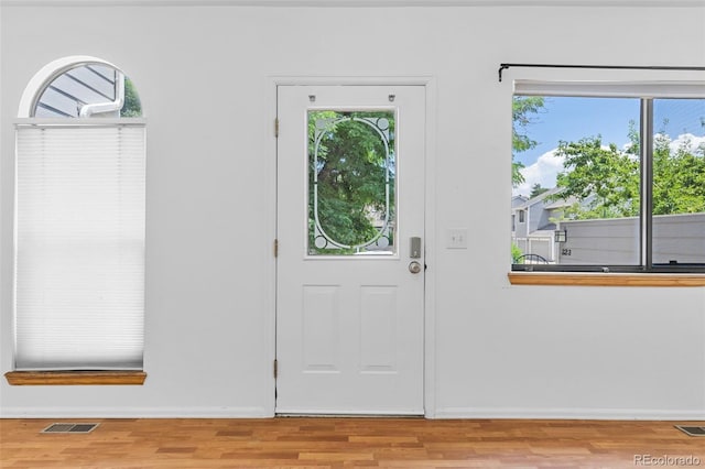 323 S Taft Ct Unit 26, Louisville, CO 80027 - foyer entrance with wood finished floors and baseboards