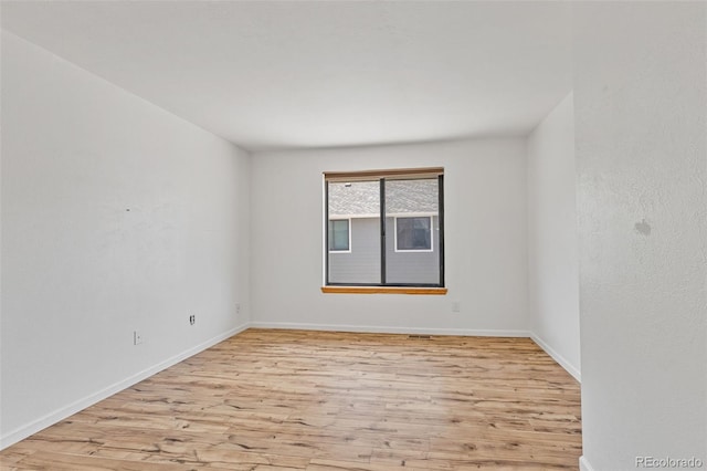 323 S Taft Ct Unit 26, Louisville, CO 80027 - unfurnished room featuring light wood-style floors and baseboards