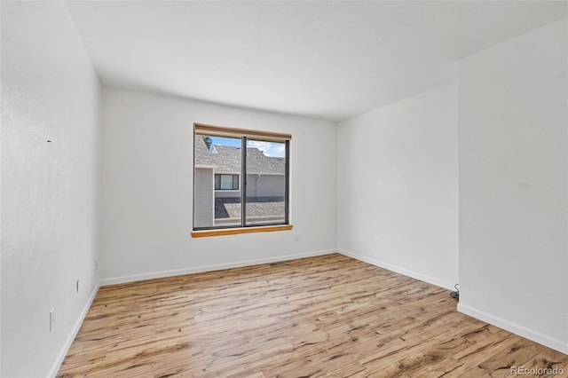 323 S Taft Ct Unit 26, Louisville, CO 80027 - unfurnished room with wood finished floors and baseboards
