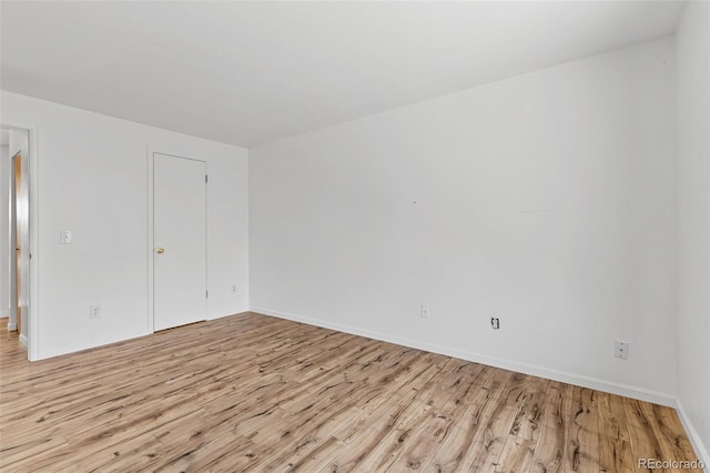 323 S Taft Ct Unit 26, Louisville, CO 80027 - unfurnished bedroom featuring light wood-style flooring and baseboards