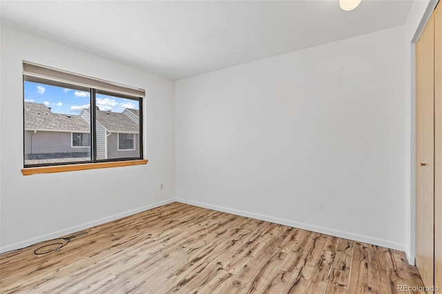 323 S Taft Ct Unit 26, Louisville, CO 80027 - unfurnished room with wood finished floors and baseboards