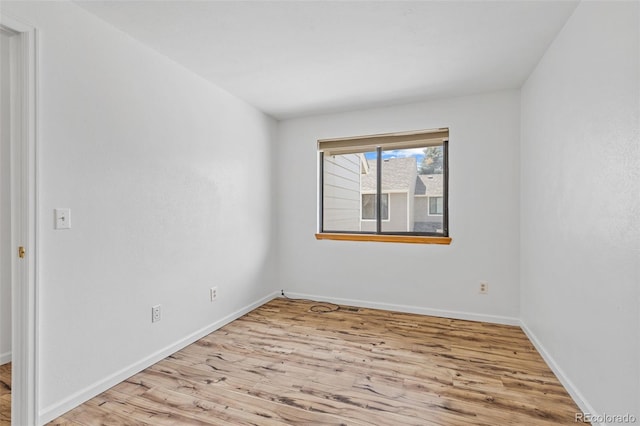 323 S Taft Ct Unit 26, Louisville, CO 80027 - unfurnished room featuring wood finished floors and baseboards