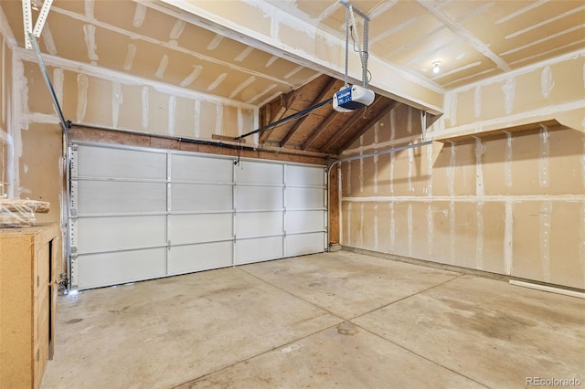 323 S Taft Ct Unit 26, Louisville, CO 80027 - garage featuring a garage door opener