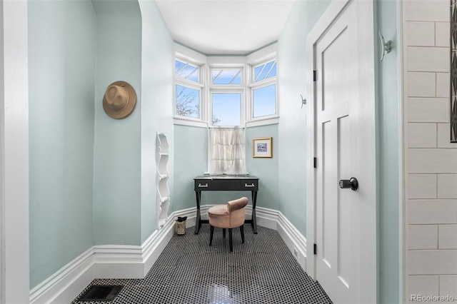 bathroom with tile patterned flooring